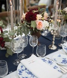 Blue China Pattern
Photography: The Day by Ira Lippke
Read More:
http://www.insideweddings.com/weddings/romantic-ceremony-on-bluff-tented-reception-in-tuscany/1311/ wedding reception table with blue floral china pattern, navy table runner, marsala and blush florals