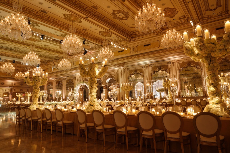 Rose-Covered Candelabra
Photography: Alain Martinez Photography
Read More:
http://www.insideweddings.com/weddings/opulent-luxury-wedding-with-white-gold-color-scheme-in-palm-beach/1375/ wedding reception in luxury ballroom the mar a lago club tall centerpiece candelabra covered roses