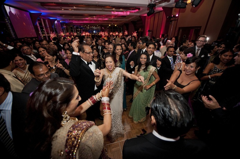 Guests Family Photos Packed Dance Floor At Indian Wedding