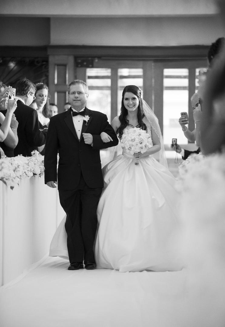 Father of the Bride
Photography: Justin Marantz
Read More:
http://www.insideweddings.com/weddings/unforgettable-miami-wedding-with-acrobats-tiger-cubs-fireworks/437/ Black and white photo of bride walking down aisle with father