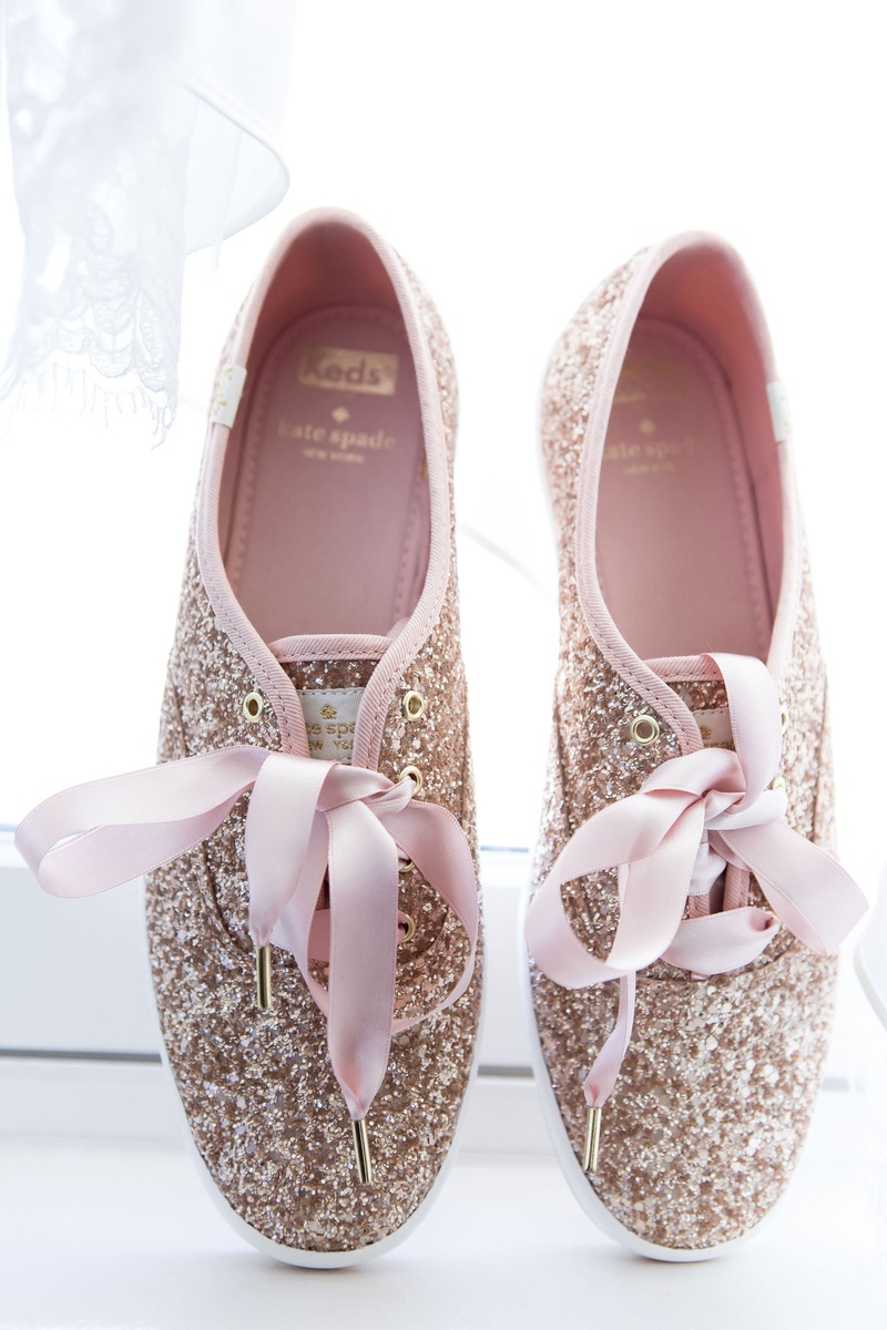 Glitter Sneakers for Wedding Reception
Photography: Maya Myers Photography
Read More:
http://www.insideweddings.com/weddings/ballroom-wedding-at-an-ocean-view-hotel-in-santa-monica-california/1325/ wedding reception shoes kate spade new york glitter keds with pink ribbon shoe strings ties comfort