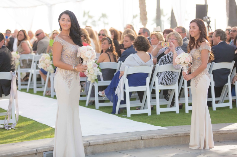 Champagne Beaded Bridesmaid Gowns
Photography: The Yodsukars
Read More:
http://www.insideweddings.com/weddings/glam-10th-wedding-anniversary-party-vow-renewal-in-california/917/ Couple's daughters waiting to walk mother and father down aisle for vow renewal wedding anniversary