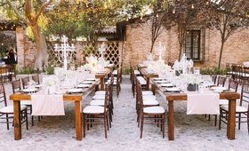 Reception at Hummingbird Nest Ranch
Photography: Ryan Phillips Photography
Read More:
http://www.insideweddings.com/weddings/outdoor-ranch-wedding-with-neutral-sparkling-decor-in-california/675/ Outdoor wedding reception with wood tables, light pink sequined runners, candelabra