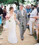 Bride and Groom Recessional
Photography: Steve Steinhardt
Read More:
http://www.insideweddings.com/weddings/tropical-romantic-destination-wedding-in-hawaii/397/ Tropical wedding ceremony and Hawaiian attire