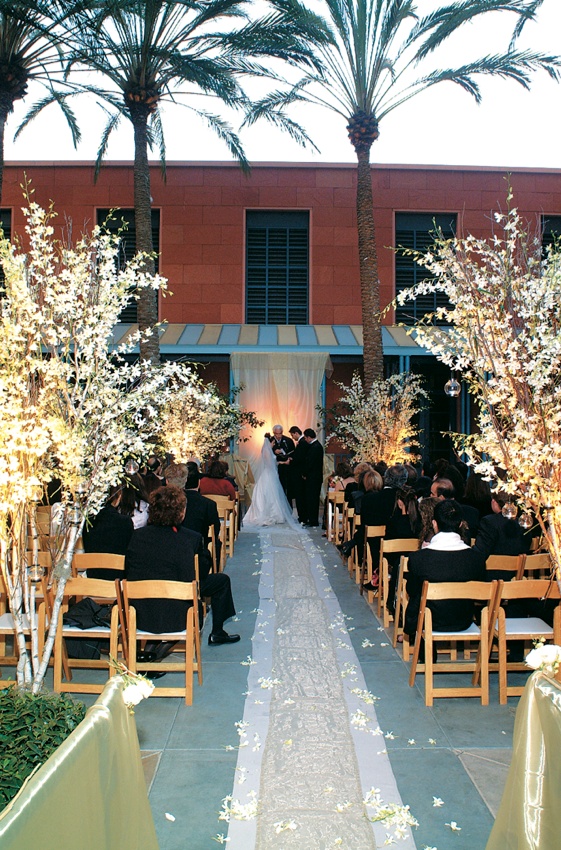 Outdoor Ceremony Décor
Photography: Lifetime Images (Steven Schlesinger)
Read More:
http://www.insideweddings.com/weddings/formal-black-tie-wedding-in-la-jolla-california/52/ Aisle runner lined with wooden chairs