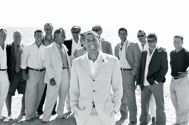 Groom with Male Attendants
Photography: John Solano Photography
Read More:
http://www.insideweddings.com/weddings/tented-beach-wedding-in-malibu-california/24/ Black and white photo of groom with male guests