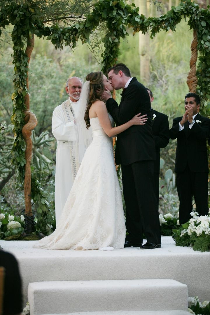 Outdoor Ceremony Kiss
Photography: Lyn Sims Photographer
Read More:
http://www.insideweddings.com/weddings/glamorous-fall-wedding-with-garden-touches-in-tucson-arizona/258/ Bride and groom kissing as husband and wife