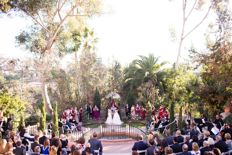 Guests Sit in Courtyard for Ceremony
Photography: Acqua Photo
Read More:
http://www.insideweddings.com/weddings/balboa-park-wedding-with-wine-inspired-color-scheme-in-san-diego/948/ southern california outdoor courtyard wedding, same-sex lesbian wedding