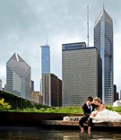 Chicago Skyline
Photography: Bob %26 Dawn Davis Photography
Read More:
http://www.insideweddings.com/weddings/spring-wedding-in-chicago-with-purple-lighting/381/ Bride and groom wading in Lake Michigan