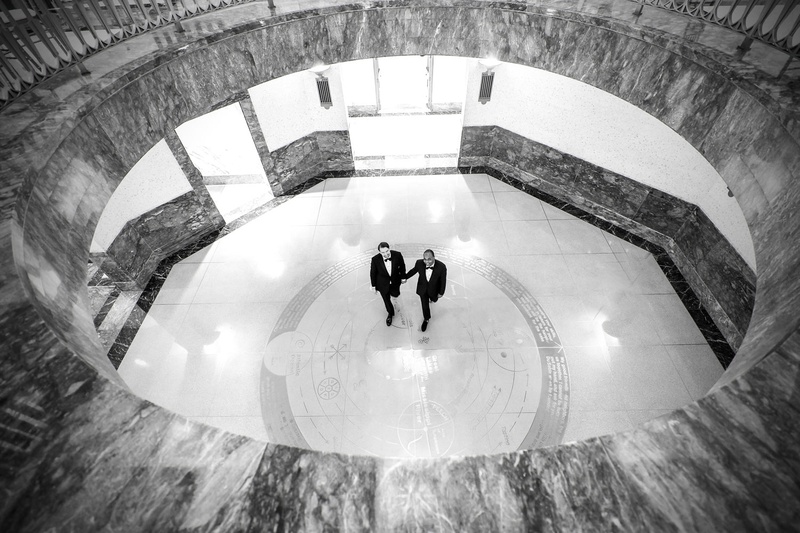 Grooms at Wedding Reception Venue
Photography: Carasco Photography
Read More:
http://www.insideweddings.com/weddings/personalized-fairy-tale-wedding-with-fun-entertainment-in-chicago/1283/ black and white photo of grooms in tuxedos at harold washington library gay lgbt wedding ideas