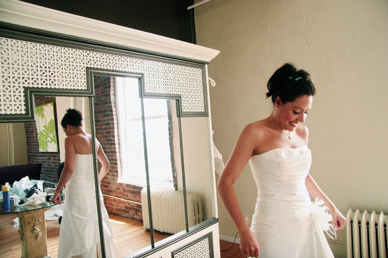 Bride Getting Ready
Photography: ASI Photography
Read More:
http://www.insideweddings.com/weddings/gold-blue-green-new-york-city-summer-wedding/181/ Cymbeline of Paris wedding dress in mirror