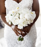 White Peony, Orchid %26 Rose Bouquet
Photography: Amy Anaiz Photography
Read More:
http://www.insideweddings.com/weddings/luxurious-royal-inspired-ballroom-real-wedding-at-a-castle-venue/1365/ bride holding wedding bouquet white rose peony orchid with jewel accents manicure nails