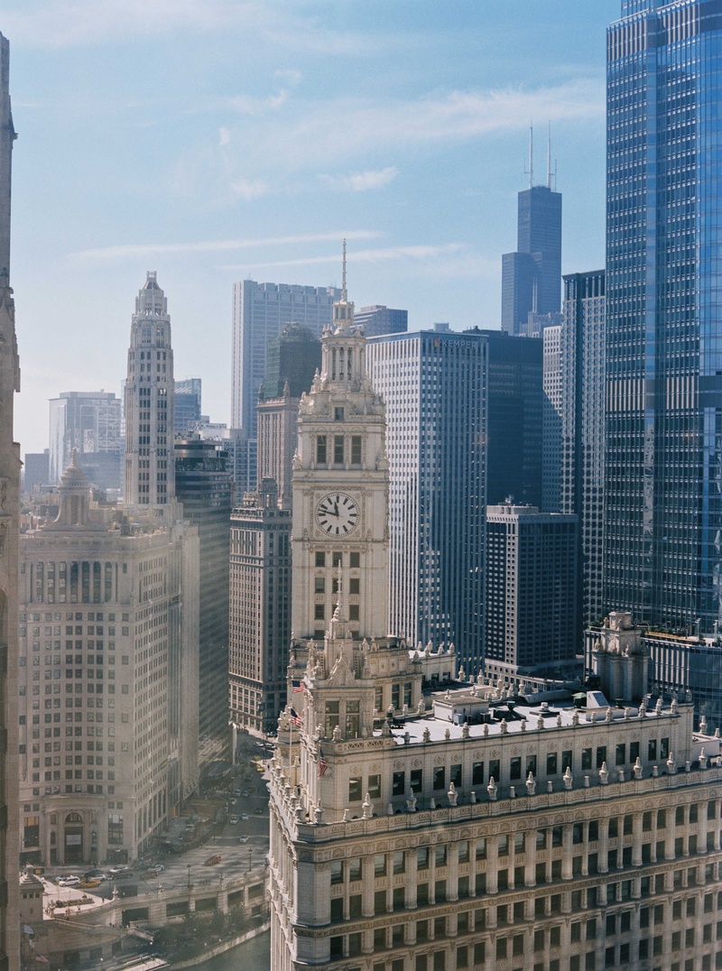 Chicago High-Rise Buildings
Photography: Amanda Sudimack for Artisan Events
Read More:
http://www.insideweddings.com/weddings/customized-chicago-wedding-with-pink-blush-marsala-color-palette/911/ Shot of Chicago from hotel room InterContinental Chicago Magnificent Mile high rise clock tower