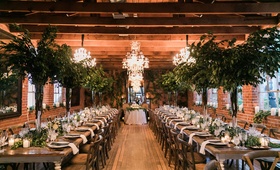 Long Reception Tables with Greenery
Photography: Valorie Darling Photography
Read More:
http://www.insideweddings.com/weddings/real-wedding-with-rustic-organic-ambience-in-downtown-los-angeles/1094/ Two wood tables with natural colored decor
