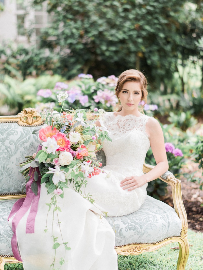Dusty Blue Vintage-Inspired Settee
Photography: Honey Honey Photography
Read More:
http://www.insideweddings.com/weddings/romantic-french-garden-decor-with-victorian-and-bohemian-style/832/ bohemian inspired bride sits on vintage blue settee Jinza Couture Bridal wedding dress