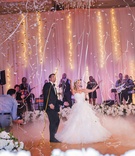 Confetti After First Dance
Photography: Willa Kveta Photography
Read More:
http://www.insideweddings.com/weddings/outdoor-ceremony-lively-reception-with-lush-white-floral-decor/1083/