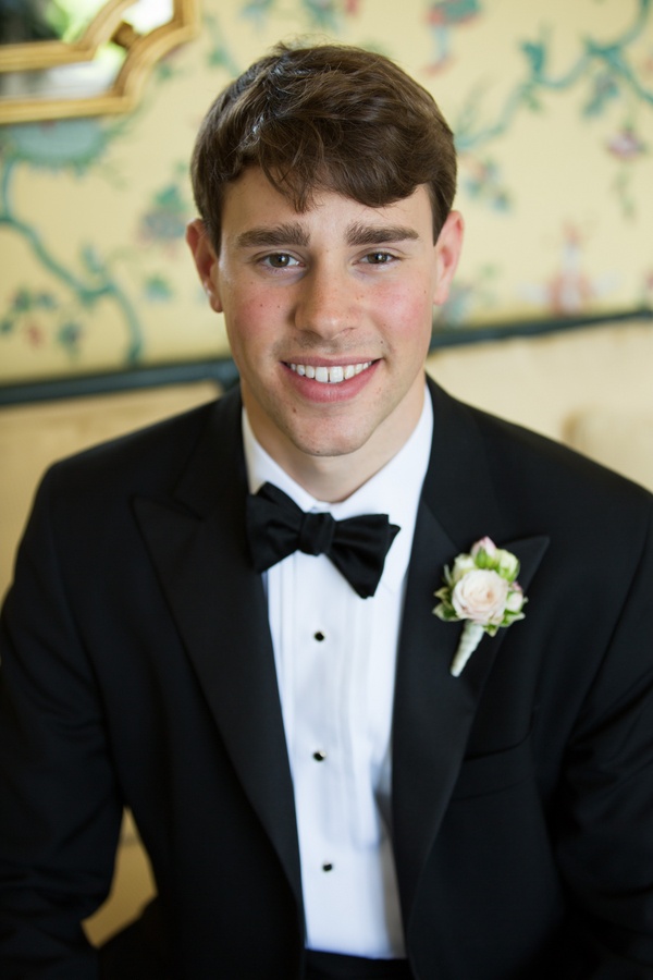 Tuxedo-Clad Groom
Photography: Aaron Watson Photography
Read More:
http://www.insideweddings.com/weddings/classic-virginia-wedding-inspired-by-grace-kellys-elegance/511/ Groom wearing tuxedo and bow tie with flower boutonniere