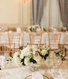 Long Tables with Small Centerpieces
Photography: Sarah Bradshaw Photography
Read More:
http://www.insideweddings.com/weddings/stunning-military-wedding-with-garden-ceremony-in-washington-dc/999/ Wedding reception neutral classic table decor with white blush flowers and gold chairs drapery