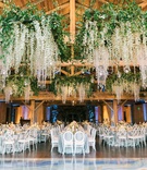 Cascading Ceiling Installation
Photography: Rachel Havel Photography
Read More:
http://www.insideweddings.com/weddings/unique-boho-chic-wedding-inspired-by-blue-agate-in-colorado/1362/ wooden beams, ceiling installations with greenery and garlands of orchids & crystals