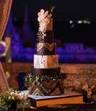 Ornate Six-Tier Wedding Cake
Photography: Manolo Doreste Photographer
Read More:
http://www.insideweddings.com/weddings/alfresco-nighttime-ceremony-and-ornate-tented-reception-in-miami/1254/ six-tier wedding cake, black and gold tiers, marble tier, sugar flowers