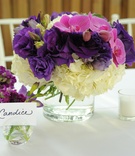 Purple, Pink, and White Centerpiece
Photography: Angela Weiss for WireImage
Read More:
http://www.insideweddings.com/weddings/vanessa-minnillo-and-nick-lachey/486/ Floral vase place card holder and centerpiece