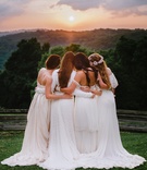 Brides Gaze Upon a Sunset
Photography: Veronica Varos Photography
Read More:
http://www.insideweddings.com/weddings/a-bohemian-inspired-wedding-shoot-in-an-enchanted-forest/643/ Brides in bohemian dresses by Daughters of Simone, Lindee Daniels, Mignonne Handmade embrace