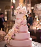 Pastel Flowers on Five-Layer Cake
Photography: The Day by Ira Lippke
Read More:
http://www.insideweddings.com/weddings/luxurious-fall-wedding-with-pink-elements-in-new-york-city/1166/ Ron Ben-Israel Cakes five layer wedding cake pink ribbon flower sugar flowers cascading down cake