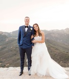 Malibu Wedding Bride %26 Groom
Photography: Love %26 You Studios
Read More:
http://www.insideweddings.com/weddings/destination-wedding-with-unique-personalized-elements-in-malibu/1079/ Bride in Monique Lhuillier wedding dress horsehair hem strapless holding groom's arm navy blue suit
