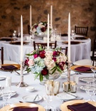 Classic Multicolored Centerpiece
Photography: Jared Platt Photography
Read More:
http://www.insideweddings.com/weddings/classic-arizona-wedding-of-denver-broncos-nfl-player-brock-osweiler/701/ Gold charger plate with purple napkin, mercury glass centerpiece with pink, blue, ivory flowers