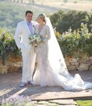Newlyweds in Tuscany
Photography: Whiskey %26 Champagne
Read More:
http://www.insideweddings.com/weddings/alfresco-wedding-with-cool-colors-overlooking-the-hills-of-tuscany/1263/ bride in marchesa wedding dress long sleeves v neck mermaid, groom in white tux and lavender shirt