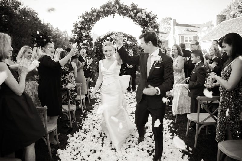 Husband %26 Wife at Hamptons Wedding
Photography: Christian Oth Studio
Read More:
http://www.insideweddings.com/weddings/timeless-wedding-with-garden-inspired-decor-in-the-hamptons/1237/ black and white photo of bride in classic wedding dress with groom flower petal toss recessional