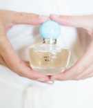 "Something Blue" Perfume Bottle
Photography: Brooke Images
Read More:
http://www.insideweddings.com/weddings/oceanfront-ceremony-classic-ballroom-reception-in-florida/936/ wedding perfume bottle with blue cap that says "something blue" oscar de la renta fragrance