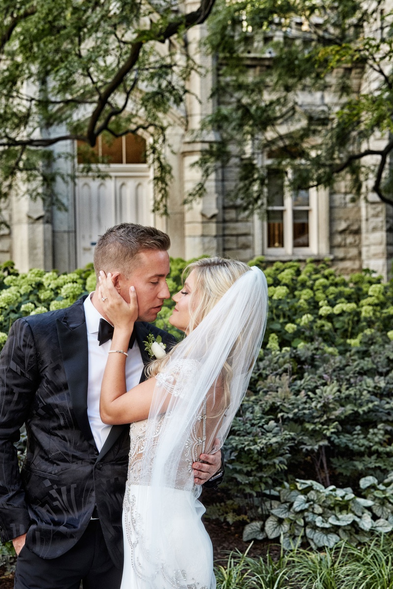 Bride %26 Groom's Kiss Portrait
Photography: KingenSmith
Read More:
http://www.insideweddings.com/weddings/modern-romantic-wedding-with-glam-geometric-details-in-chicago/1171/ Bride in jeweled wedding dress from bella bianca couture veil blonde hair kissing groom in tuxedo