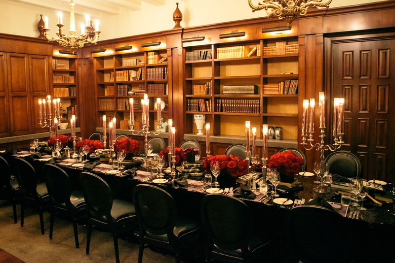 Let's Read
Photography: Michelle Mosqueda
Read More:
http://www.insideweddings.com/biz/white-lilac-inc-costa-mesa/8787/ Stacked books, crimson flowers and moody candlesticks dressed up this table set in an antique librar