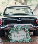 Vintage Car with "The Beginning" Sign
Photography: Lucas Rossi
Read More:
http://www.insideweddings.com/weddings/vibrant-styled-shoot-with-colorful-bohemian-inspired-details/793/ vintage getaway car for bride and groom with sign surrounded by greenery garland
