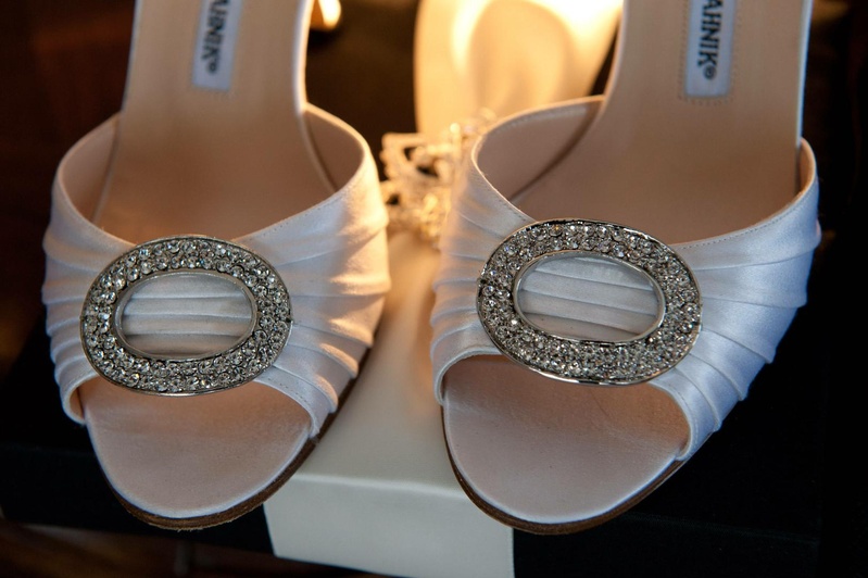 Bride's Manolo Blahnik Heels
Photography: Josh Lynn Photography
Read More:
http://www.insideweddings.com/weddings/purple-white-gold-new-jersey-celebration/339/ Bride's Manolo Blahnik heels with a sparkling accent