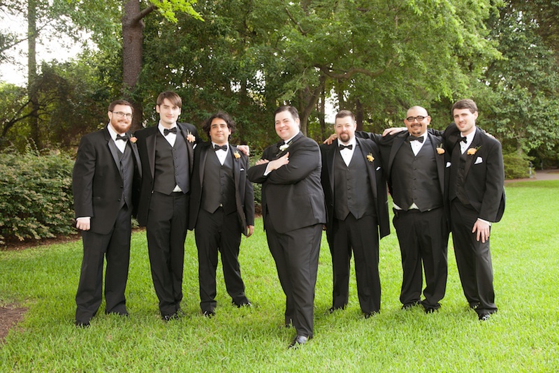 Tuxedo-Clad Groomsmen in Houston
Photography: Michael Carr Photography
Read More:
http://www.insideweddings.com/weddings/traditional-church-ceremony-forest-inspired-reception-in-houston/695/ Groom with six groomsmen in tuxedos on grass lawn