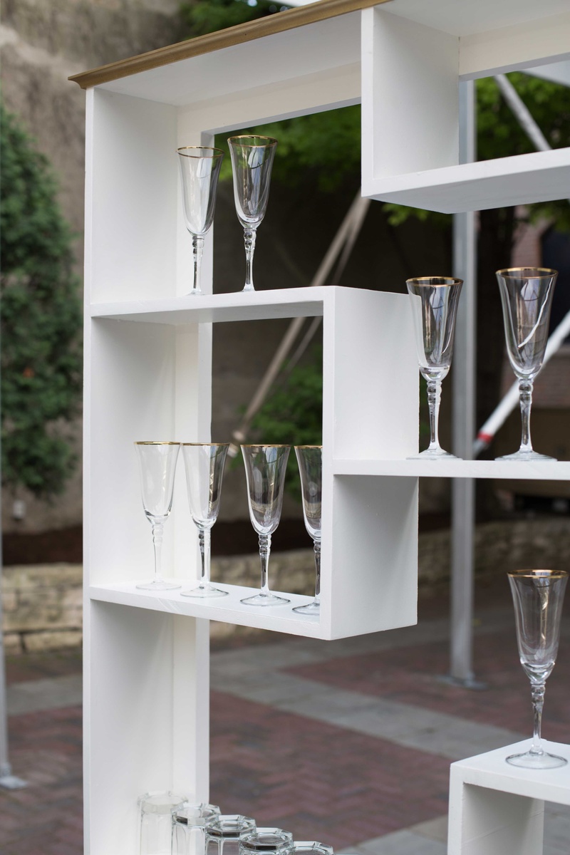 Reception Décor Photos MultipleLeveled Shelf Behind Bar Inside