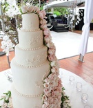 Wedding Cake
Photography: LiquidLightImages Photography
Read More:
http://www.insideweddings.com/weddings/michelle-raab-and-angus-mitchell/351/ White wedding cake with light pink and white roses topped with couple's monogram