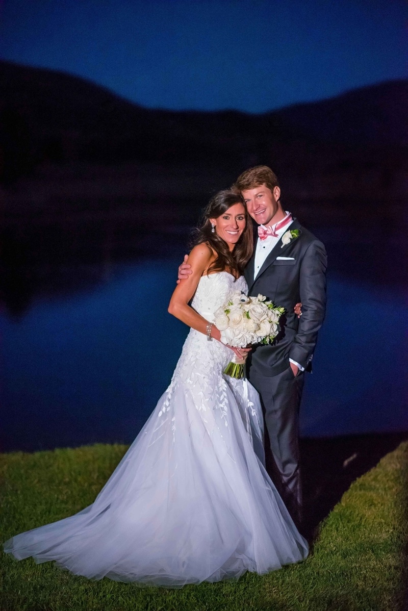 Evening Portrait for Aspen Couple
Photography: Brett Butterstein Photography
Read More:
http://www.insideweddings.com/weddings/incredible-tented-ceremony-barn-reception-at-ranch-in-aspen/860/ Bride in strapless Carolina Herrera gown with embroidery and tulle skirt groom in pink bow tie