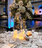 Courtyard Reception Décor
Photography: Artisan Events
Read More:
http://www.insideweddings.com/weddings/breathtaking-blue-wedding-at-the-art-institute-of-chicago/251/ Fountain-side table with romantic centerpiece