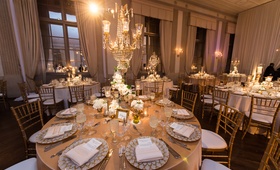 Metallic Chandelier Centerpiece
Photography: Carasco Photography
Read More:
http://www.insideweddings.com/weddings/jewish-wedding-with-classic-ivory-and-gold-decor-in-chicago/983/ crystal chandelier with white florals on metallic tablescape