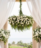 Floral Chandelier at Ceremony
Photography: Chard Photo
Read More:
http://www.insideweddings.com/weddings/alfresco-ceremony-on-the-coast-classic-ballroom-reception/1290/ the resort at pelican hill wedding under a rotunda with floral chandelier