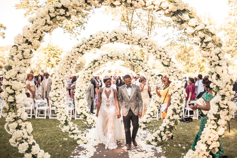 Ivory Floral Arches at Ceremony
Photography: Brian Bossany Photography
Read More:
http://www.insideweddings.com/weddings/luxurious-heaven-inspired-royal-wedding-celebration-in-minneapolis/1333/ wedding ceremony bride in haute couture gown tiara groom in grey tuxedo circle arches white flowers