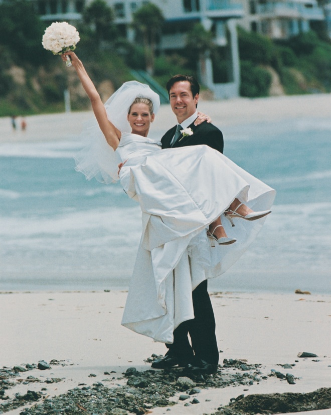Beach Bride %26 Groom
Photography: Barnet Photography
Read More:
http://www.insideweddings.com/weddings/green-and-white-oceanfront-wedding-in-laguna-beach-california/71/ Groom holds bride on Laguna Beach sand