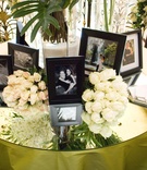 Cocktail Hour Display Table
Photography: John Solano Photography
Read More:
http://www.insideweddings.com/weddings/chic-black-white-green-wedding-at-the-beverly-hills-hotel/254/ Framed photos of bride and groom on mirror table