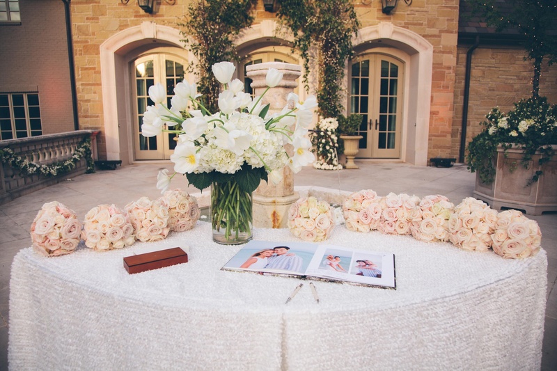 Guest Book Display
Photography: David %26 Tammy Molnar
Read More:
http://www.insideweddings.com/weddings/an-exquisite-backyard-wedding-in-tennessee/532/ Guestbook with photos and bridal party bouquets