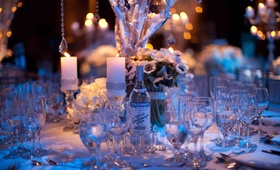Vodka Bottle Centerpiece
Photography: Ira Lippke Studios
Read More:
http://www.insideweddings.com/weddings/white-winter-wedding-at-capitale-in-new-york-city/375/ Winter wedding centerpiece with blue lighting and crystals