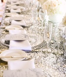 Clear Chargers with Silver Sequined Linens
Photography: Brian Leahy Photography
Read More:
http://www.insideweddings.com/weddings/beachy-southern-california-ceremony-winter-wonderland-reception/877/ silver sequin tablecloths and clear chargers on reception table