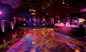 Colorful Dance Floor
Photography: Simone %26 Martin Photography
Read More:
http://www.insideweddings.com/weddings/sophisticated-wedding-at-southern-california-estate/296/ Purple and fuchsia lighting on bar and tent